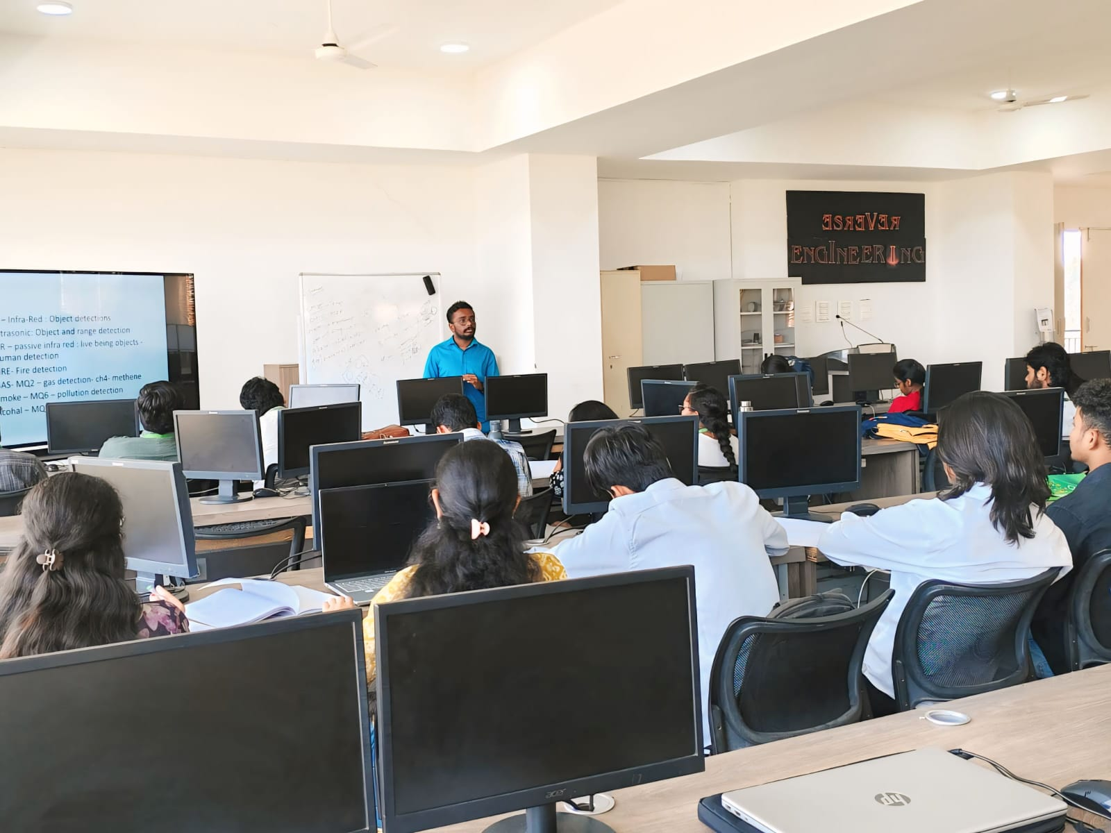 Students attending a technology training session in a computer lab